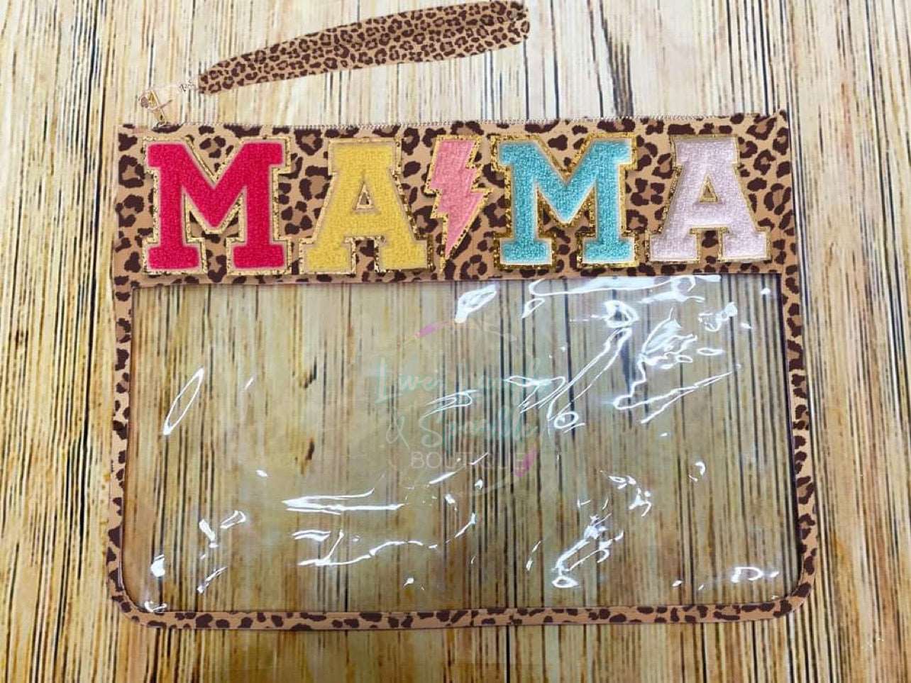Leopard and clear zipper bag with the word Mama on it.