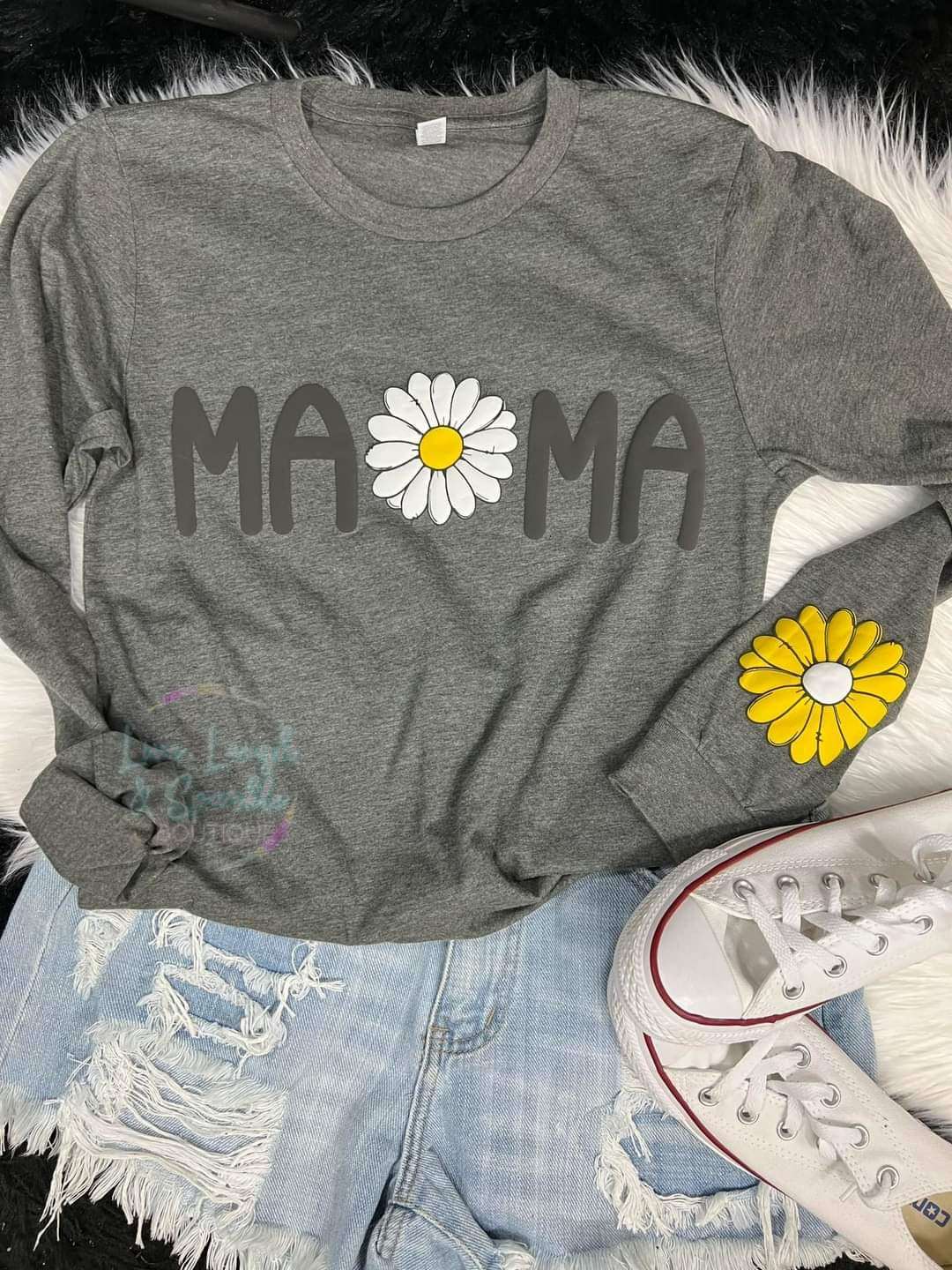 Gray long sleeve top with the word Mama on it and a white flower. Also a yellow flower on the sleeve.