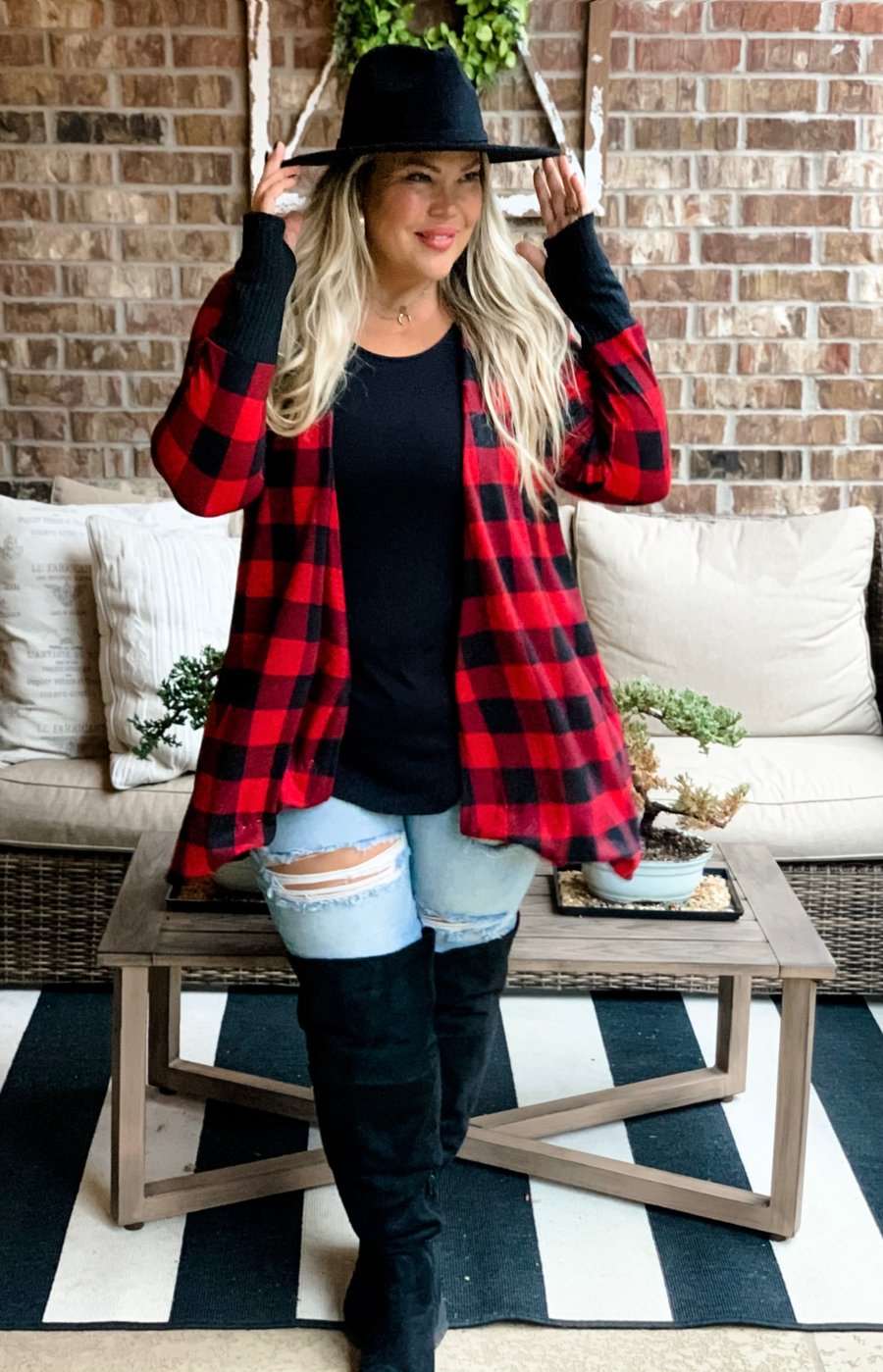 Buffalo plaid cardigan with thumb holes. 