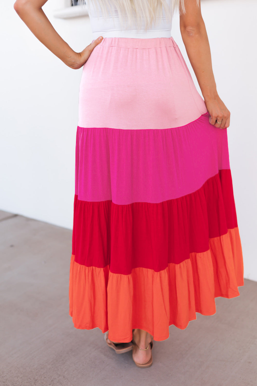 Light pink, hot pink, red, coral tiered skirt. Drawstring elastic waist.