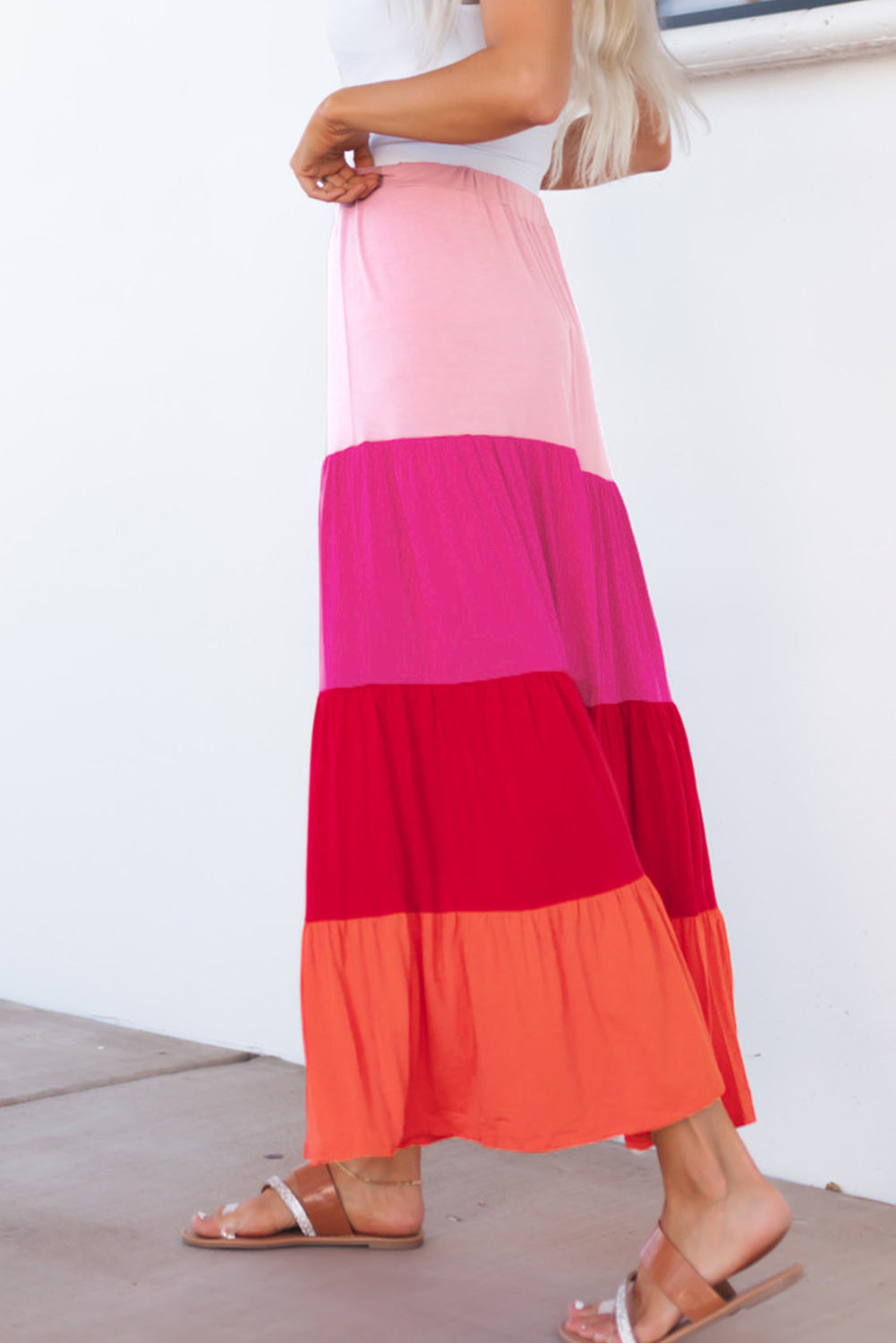 Light pink, hot pink, red, coral tiered skirt. Drawstring elastic waist.